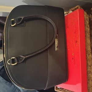 Beautiful purchased but never used Anne Klein Black Satchel polka dot interior